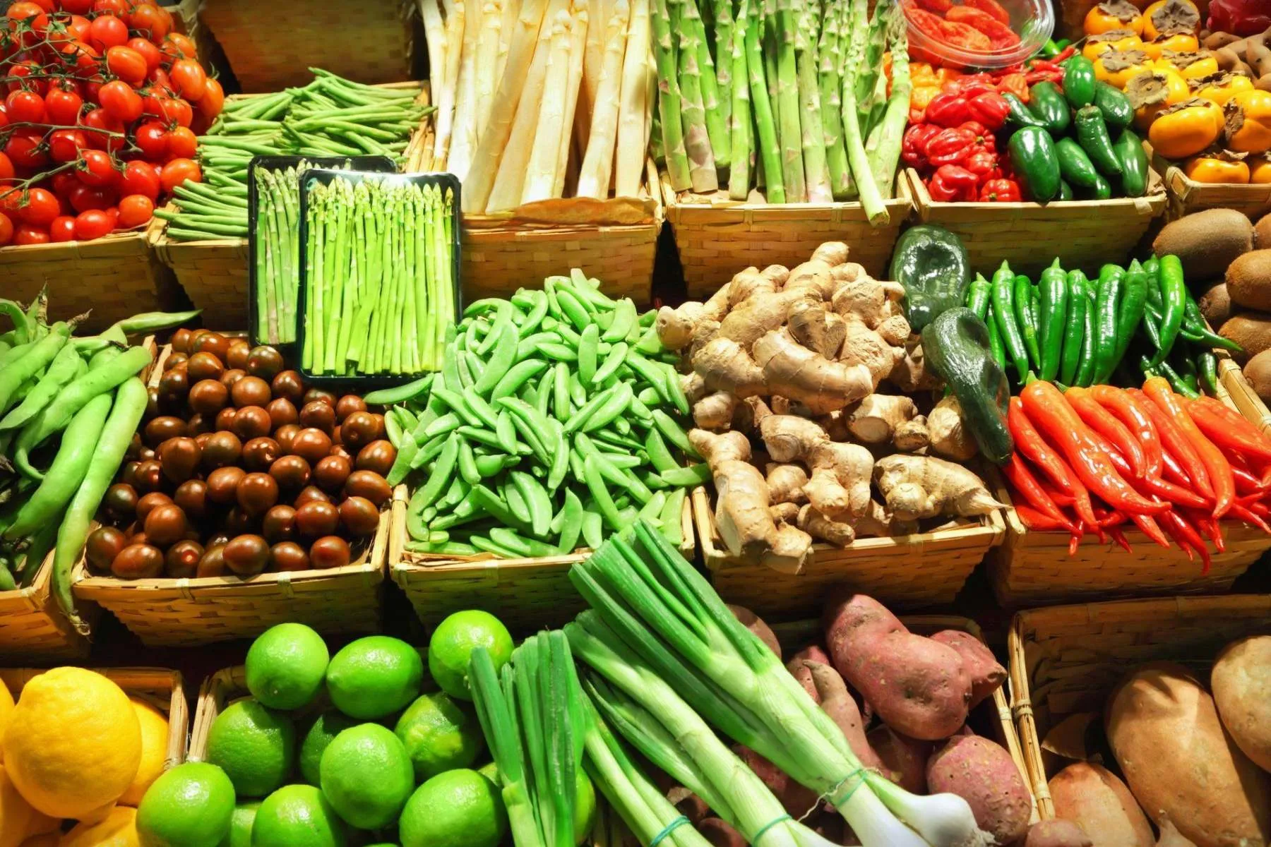 Greengrocer stall of beans, asparagus and peppers at Evans and Clark Rogerstone